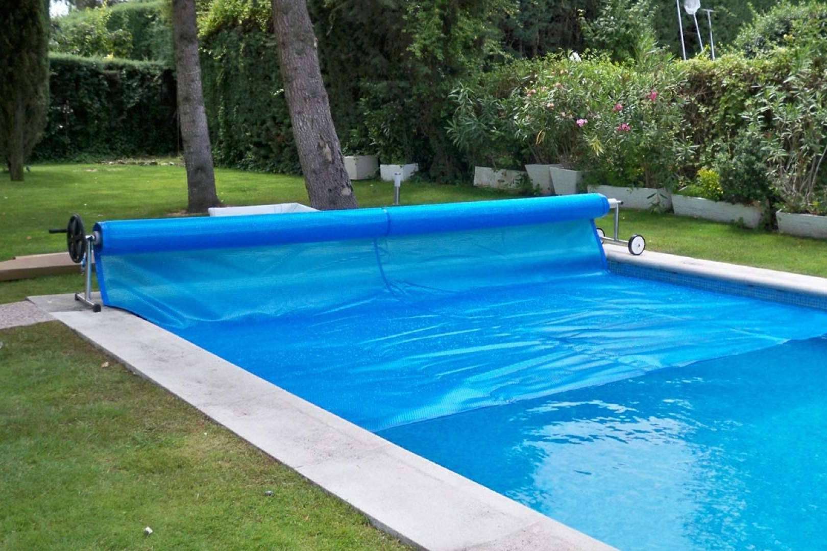 Cubiertas para piscinas, lonas y toldos de invierno comercializadas por Swimhome